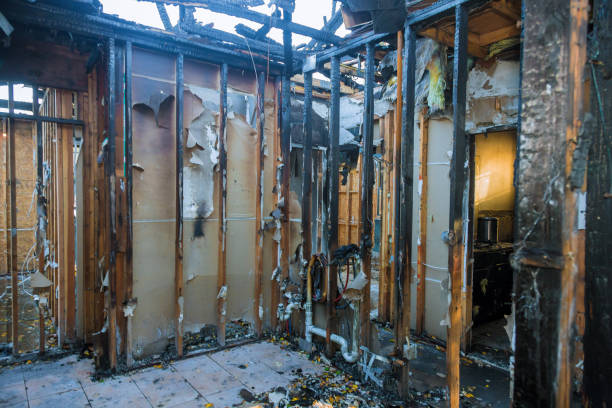 Professional Fire Damage Restoration technician working in Claremont, NH